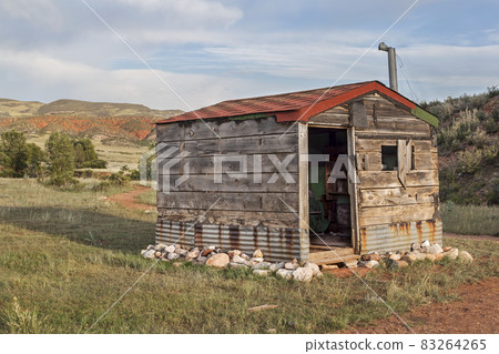 old cabin in Rocky Mountains 83264265