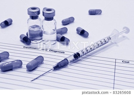 Vial of drugs or vaccine, 1 ml plastic syringe with needle, drug capsule and OPD card isolated on the white background Vial of drugs or vaccine, 1 ml plastic syringe with needle, drug capsule and OPD card isolated on the white background 83265608