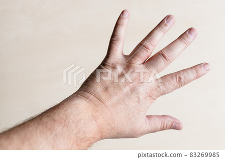 male back of hand with spread out five fingers 83269985