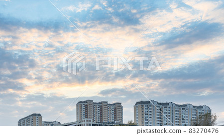 blue sunset sky over high-rise apartment building blue sunset sky over high-rise apartment building 83270476