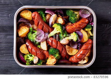 Sausage and vegetable traybake, top view, close-up Sausage and vegetable traybake, top view, close-up 83270596