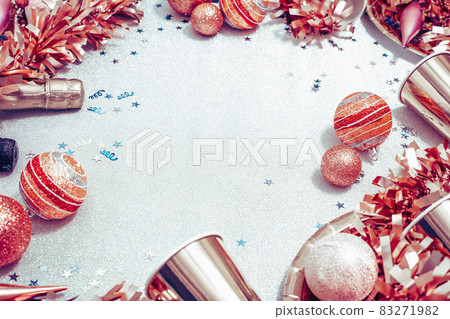 Golden red Christmas decorations border top view monochrome Golden red Christmas decorations border top view monochrome 83271982