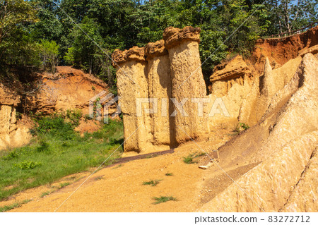 Within a national park named Phae Mueang Phi caused by the terrain which is the soil and sandstone was naturally eroded into various shapes that are In Phrae Province of Thailand. 83272712