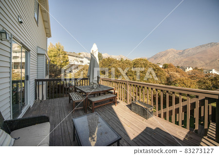 View of Mount Timpanogos, Wasatch mountains from a deck patio of a house 83273127