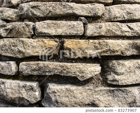 Close-up view of a stone wall 83273907