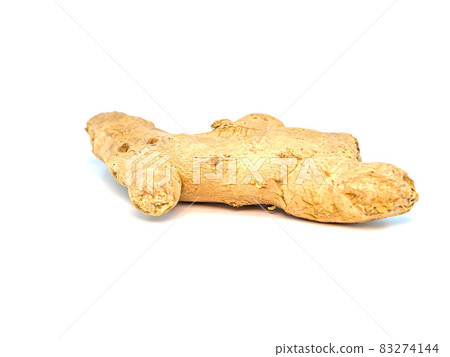 Ginger root on a white background with place for text. 83274144