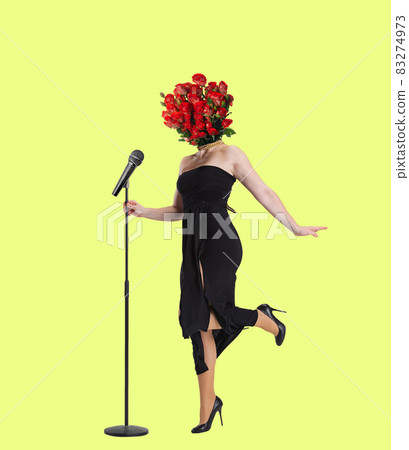 Contemporary art collage of woman with roses head, singer isolated over neon yellow background 83274973