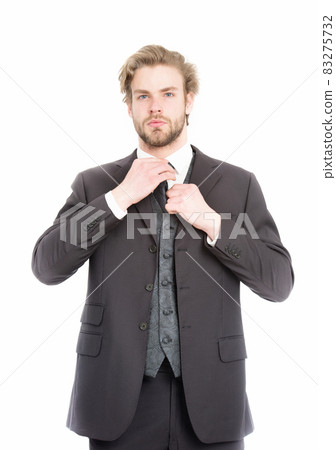 businessman in black formal outfit with serious face 83275732