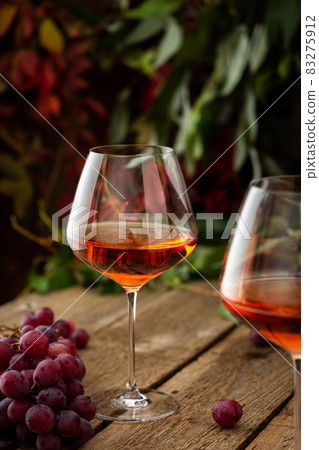 Glasses with rose wine 83275912