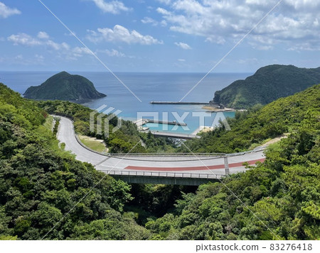The sea, the horizon, the islands, the harbor, and the winding roads of the remote islands of Okinawa The sea, the horizon, the islands, the harbor, and the winding roads of the remote islands of Okinawa 83276418