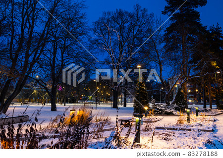 Christmas decorations in the central park of Kouvola with evening light illumination. 83278188