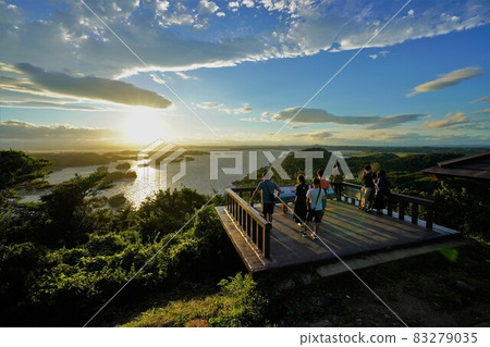 Tourists watching the sunset from the summit of Mt. Otakamori 83279035