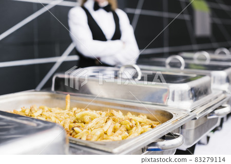 freshly cut french fries buffet. High quality and resolution beautiful photo concept freshly cut french fries buffet. High quality and resolution beautiful photo concept 83279114