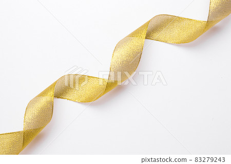 golden shiny ribbon wrap. High quality and resolution beautiful photo concept golden shiny ribbon wrap. High quality and resolution beautiful photo concept 83279243