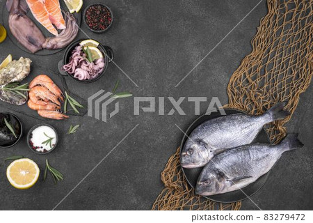 ingredients seafood with fish net copy space. High quality and resolution beautiful photo concept 83279472