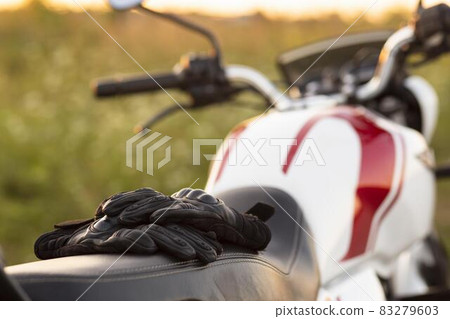 front view gloves motorcycle. High quality and resolution beautiful photo concept front view gloves motorcycle. High quality and resolution beautiful photo concept 83279603