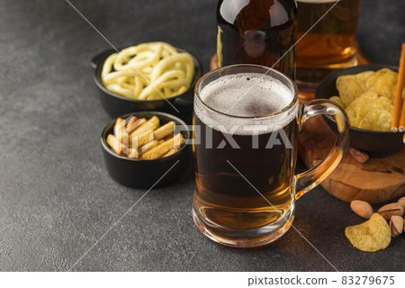 high angle beer mug snacks. High quality and resolution beautiful photo concept high angle beer mug snacks. High quality and resolution beautiful photo concept 83279675