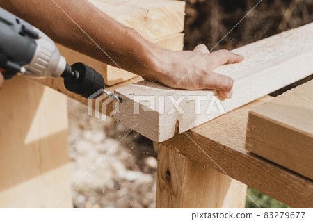 high view person holding hammer drill. High quality and resolution beautiful photo concept 83279677