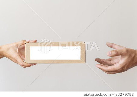 hand giving donation box needy person. High quality and resolution beautiful photo concept 83279798