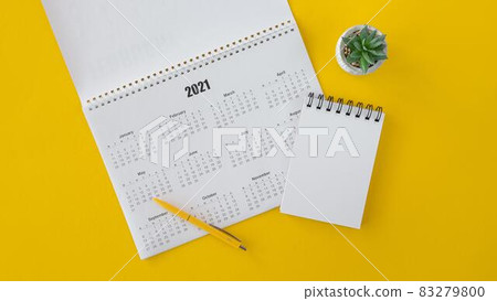 flat lay calendar copy space notepad. High quality and resolution beautiful photo concept flat lay calendar copy space notepad. High quality and resolution beautiful photo concept 83279800