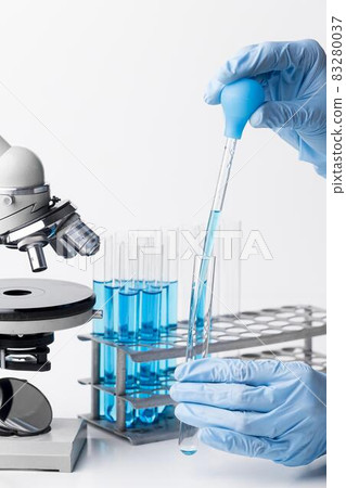 front view blue chemical substances lab. High quality and resolution beautiful photo concept front view blue chemical substances lab. High quality and resolution beautiful photo concept 83280037