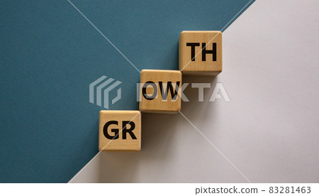 Business growth success process symbol. Wood block stacking as step stair on paper blue and white background with word 'growth', copy space. Business and growth concept. Business growth success process symbol. Wood block stacking as step stair on paper blue and white background with word 'growth', copy space. Business and growth concept. 83281463