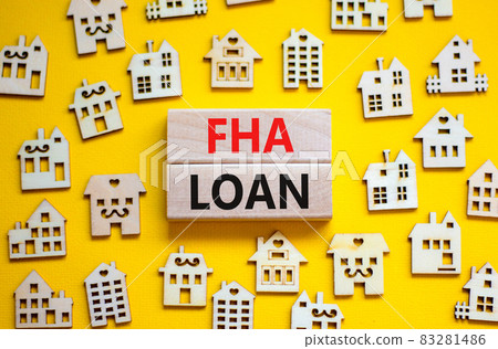 FHA federal housing administration loan symbol. Concept words 'FHA federal housing administration loan' on wooden blocks on a beautiful yellow background. Business and FHA loan concept. Copy space. FHA federal housing administration loan symbol. Concept words 'FHA federal housing administration loan' on wooden blocks on a beautiful yellow background. Business and FHA loan concept. Copy space. 83281486