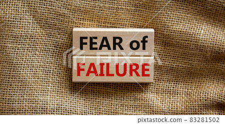 Fear of failure symbol. Wooden blocks with words 'fear of failure'. Beautiful canvas background, copy space. Business, fear of failure concept. 83281502