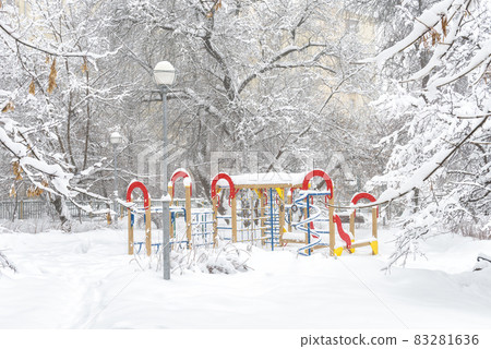 Winter landscape in Moscow, Russia. Scenery of snowy trees and playground Winter landscape in Moscow, Russia. Scenery of snowy trees and playground 83281636