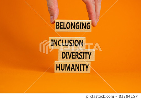 Humanity, diversity, inclusion, belonging symbol. Wooden blocks with words humanity, diversity, inclusion, belonging on beautiful orange background. Diversity, humanity, inclusion, belonging concept. Humanity, diversity, inclusion, belonging symbol. Wooden blocks with words humanity, diversity, inclusion, belonging on beautiful orange background. Diversity, humanity, inclusion, belonging concept. 83284157