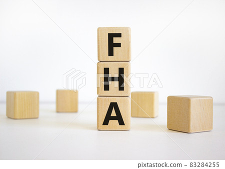 FHA, federal housing administration symbol. Wooden cubes with words FHA, federal housing administration. Beautiful white background, copy space. Business, FHA - federal housing administration concept. 83284255