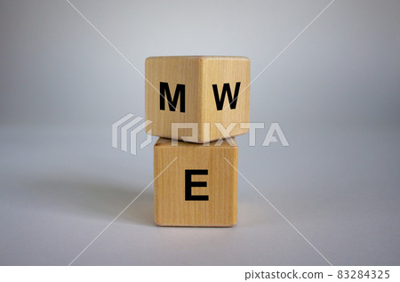 Expanded wood cube with me or we words on beautiful white background, copy space. Expanded wood cube with me or we words on beautiful white background, copy space. 83284325