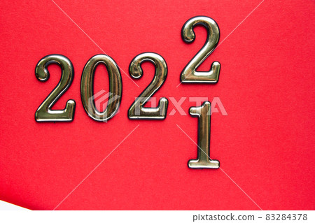 festive and numbers 2022 on red background new year 83284378
