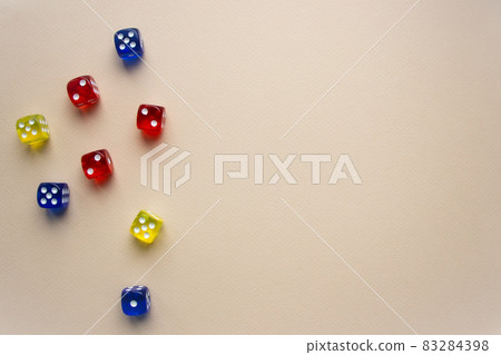 dice red and blue and yellow color light background dice red and blue and yellow color light background 83284398