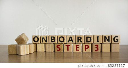 Time to step 3 onboarding. Words 'Onboarding step 3' written on wooden blocks. Business and success step 3 onboarding concept. Beautiful wooden table, white background. Copy space. 83285117