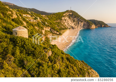 Aerial view of Milos beach near the Agios Nikitas village on Lefkada Ionian island, Greece. Evening sunset golden light 83286056