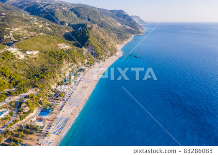 Aerial view of Milos beach near the Agios Nikitas village on Lefkada Ionian island, Greece. Evening sunset golden light 83286083