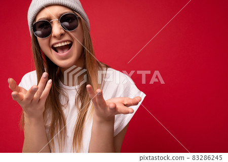 Are you serious? Closeup photo of beautiful attractive shocked amazed surprised young woman with Are you serious? Closeup photo of beautiful attractive shocked amazed surprised young woman with 83286245