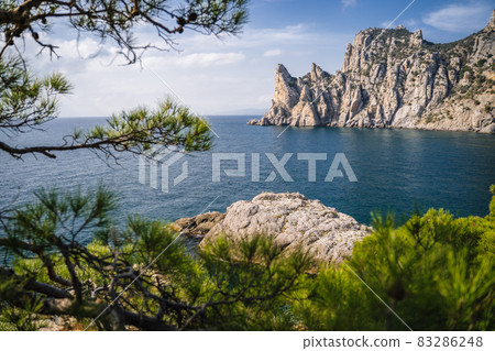 Landscape view of Karaul-Oba mountain and Blue bay in Crimea, New Light resort, Russian Federation Landscape view of Karaul-Oba mountain and Blue bay in Crimea, New Light resort, Russian Federation 83286248
