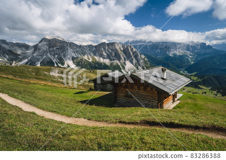 Hats for resting during the hike on Seceda plateau in Dolomites Alps, Odle mountain range, South Tyrol, Italy, Europe Hats for resting during the hike on Seceda plateau in Dolomites Alps, Odle mountain range, South Tyrol, Italy, Europe 83286388