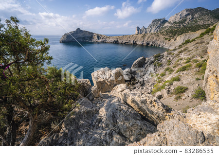 Novyi Svit, Crimea, Sudak. Cape named Kapchik, sea is Black Sea. Beautiful landscape with views of the mountains, sea, forest 83286535