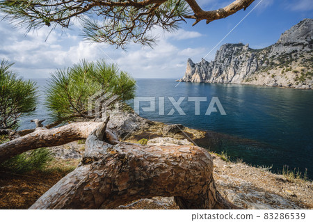 Scenic mountain Karaul-Oba nearby coastline of Black Sea. Structure formed by pre-historic corals. Shot near town Novyi Svit, Crimea 83286539