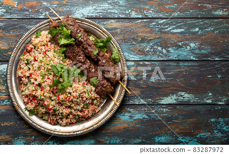 Arab Turkish kebab with tabbouleh salad Arab Turkish kebab with tabbouleh salad 83287972