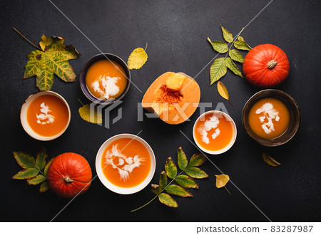 Plates with cream pumpkin soup Plates with cream pumpkin soup 83287987