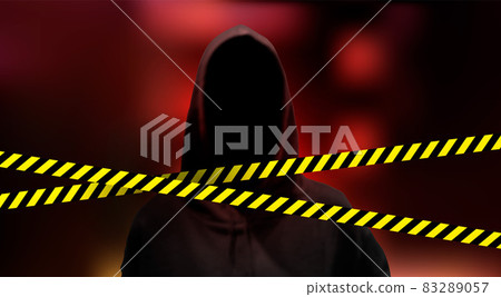 Silhouette of a hacker on red background with crime scene ribbon 83289057