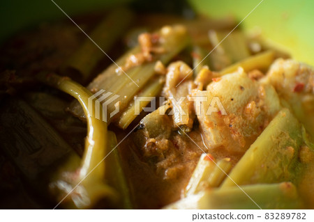 Thai food Kaeng The Po or Thai Pork Curry with Morning Glory. 83289782