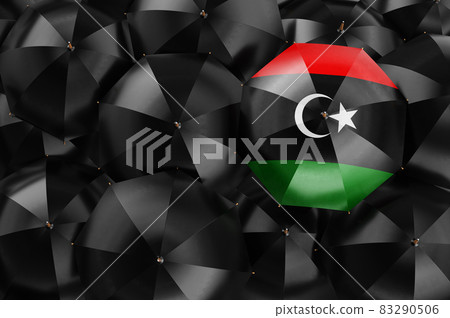 Umbrella with Libyan flag among black umbrellas, 3D rendering 83290506