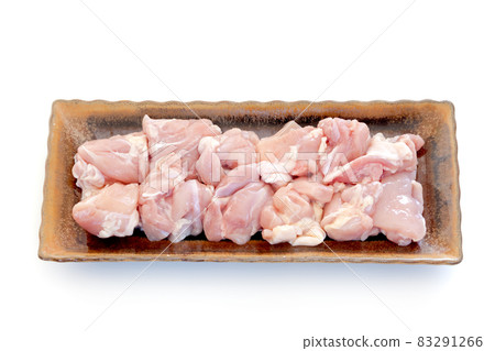 Young chicken thigh cut for fried chicken [on a plate] 83291266