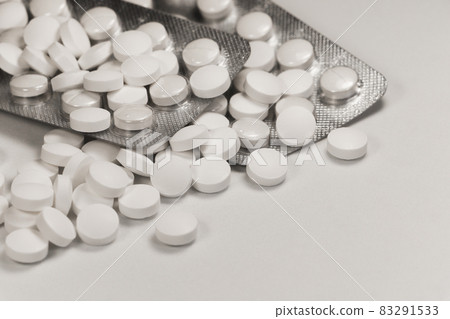White Pill Medication And Tray Packaging Abstract Close-up On White White Pill Medication And Tray Packaging Abstract Close-up On White 83291533