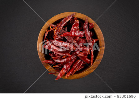dried chili on stone background dried chili on stone background 83301690